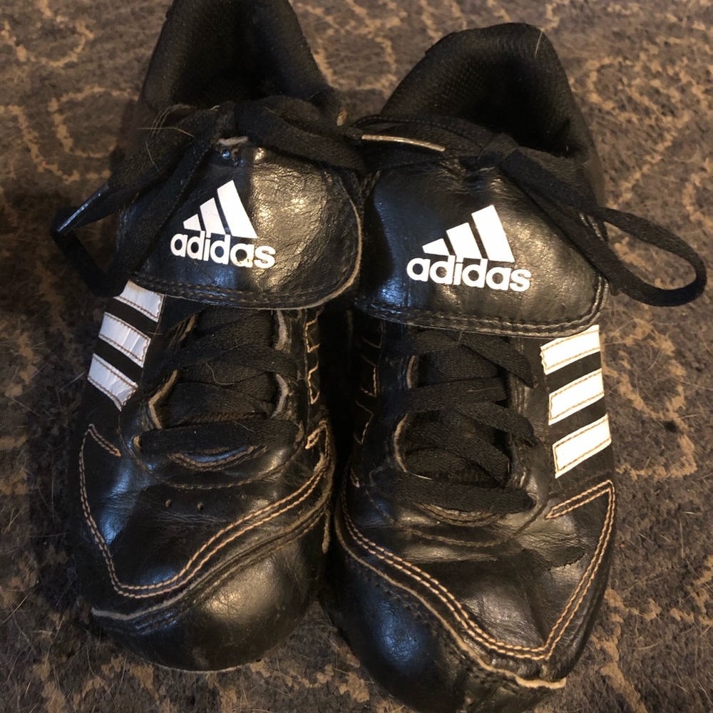 Classic, black Adidas baseball cleats, in GUC.